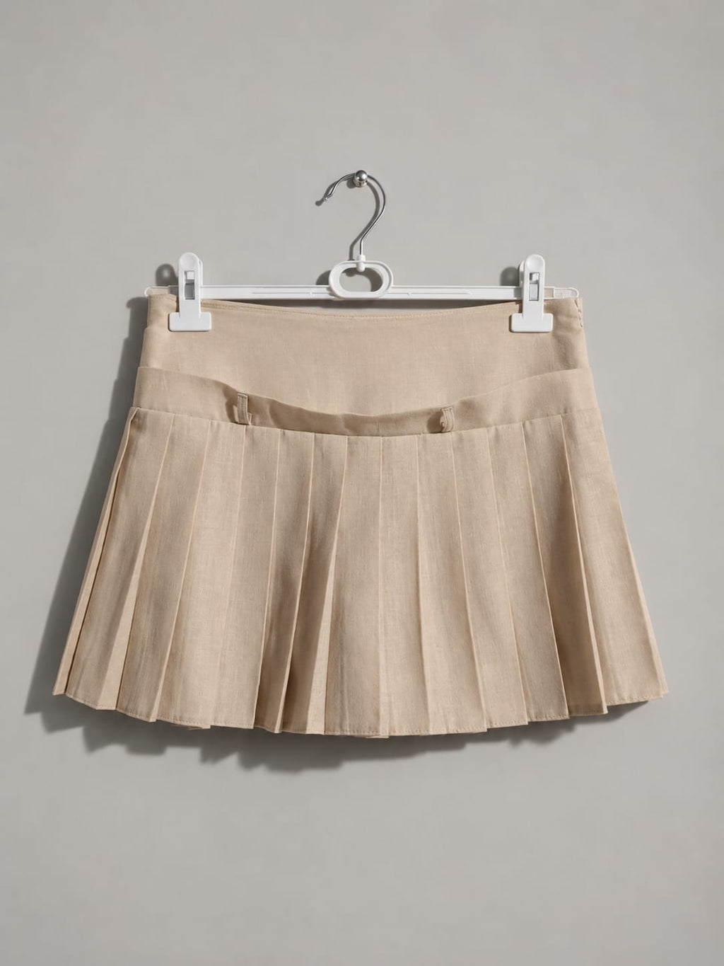 IVORY MOTION PLEATED SKIRT