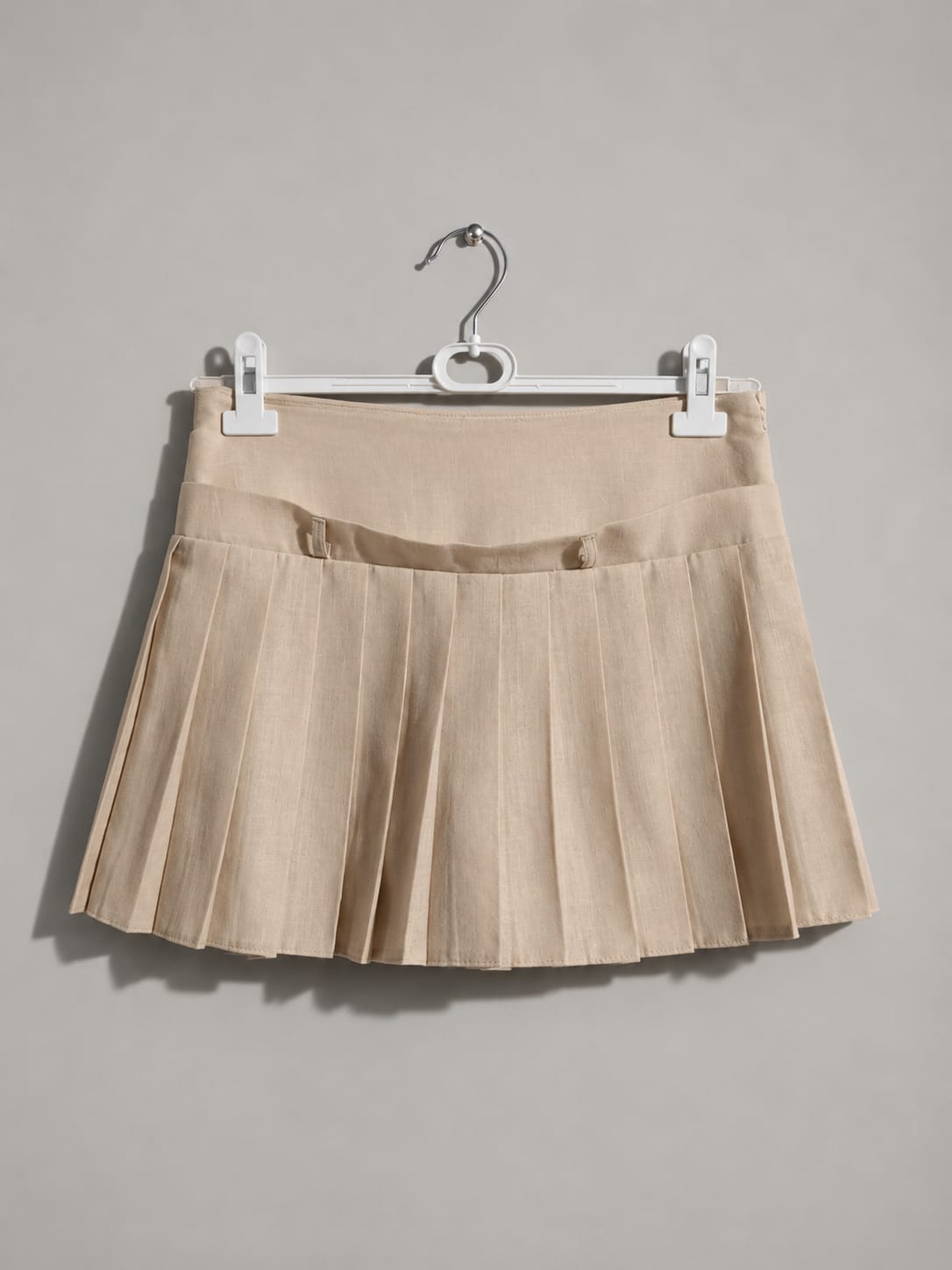 IVORY MOTION PLEATED SKIRT